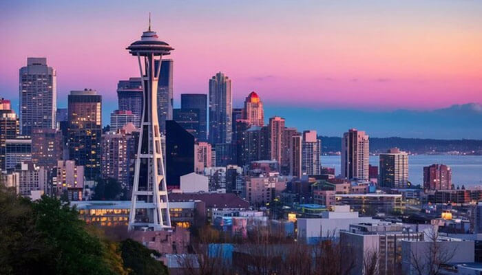 Seattle skyline at dusk with the Space Needle and waterfront
