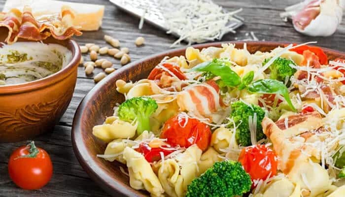 Tortellini Salad - Food Fun Trip - FoodFunTrip A vibrant pasta salad with tortellini, roasted tomatoes, broccoli, and a sprinkling of Parmesan, making for a flavorful, healthy dish