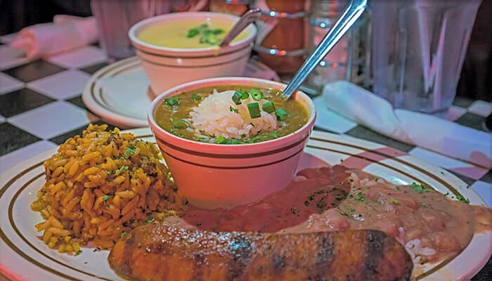 Enjoy Local Cuisine - Food Fun Trip - FoodFunTrip A traditional New Orleans dish featuring sausage, rice, and beans, a flavorful staple of the city’s Creole and Cajun cuisine