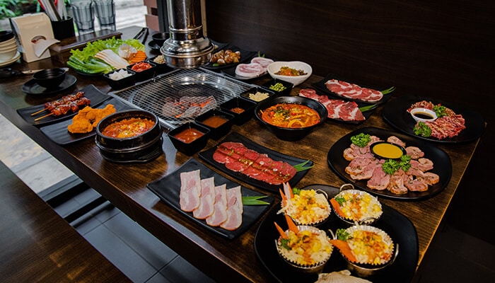 Elevated Culinary Experiences - Food Fun Trip - FoodFunTrip All Inclusive Travel dining experience featuring premium Korean BBQ, grilled meats, seafood, traditional side dishes, and luxury restaurant cuisine for travelers exploring international food culture and gourmet vacation packages.
