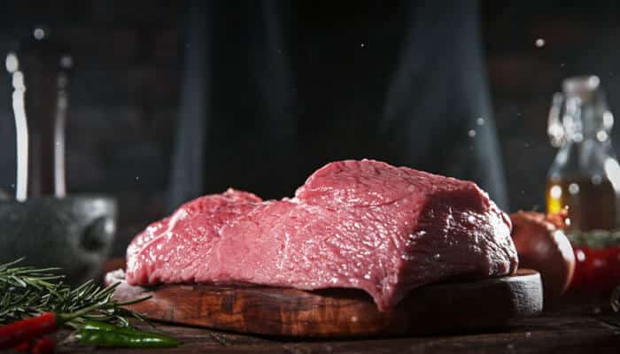 Notable Online Butchers Known for Aged Steak Offerings - Food Fun Trip - FoodFunTrip Fresh raw beef steak prepared for premium meat delivery, showcasing quality cuts sourced from Online Butchers specializing in wet-aged and dry-aged beef for restaurant-grade cooking at home.