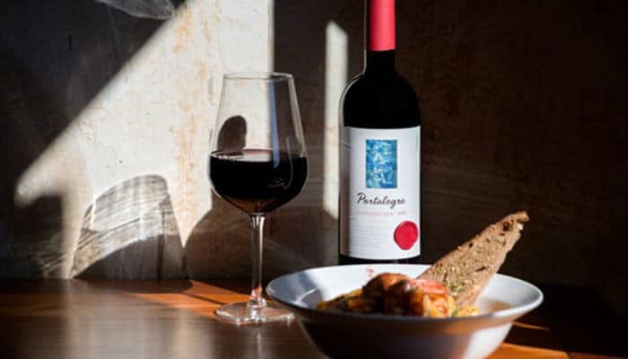 Which Trails Serve the Best Food - Food Fun Trip - FoodFunTrip Rustic Portuguese meal of bread, cheese, and wine on a table