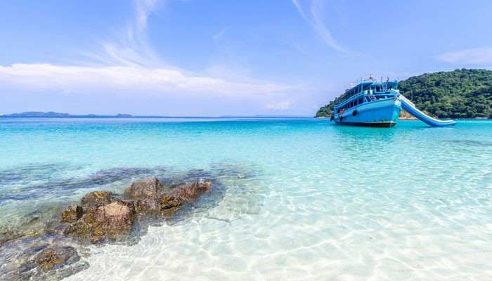 Mai Khao Beach Best Beach for Privacy and Nature - Food Fun Trip - FoodFunTrip Best Beaches in Phuket featuring Mai Khao Beach with crystal-clear turquoise waters, peaceful shoreline, tropical scenery, and a relaxing island escape in Thailand