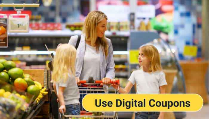 Use Digital Coupons - Food Fun Trip - FoodFunTrip Food 4 Less shoppers using digital coupons through grocery savings features while selecting affordable products during a family shopping trip