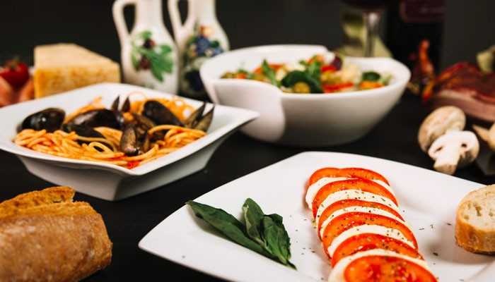 What to Eat in Croatia - Food Fun Trip - FoodFunTrip Croatia Travel Guide featuring traditional Croatian cuisine with seafood pasta, fresh Mediterranean ingredients, tomato mozzarella salad, and authentic coastal dishes inspired by Adriatic food culture