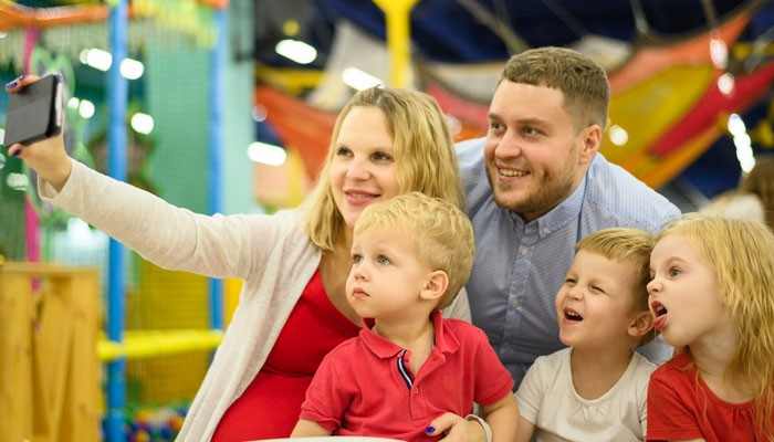 Who Should Visit Nova Adventure Park - Food Fun Trip - FoodFunTrip Family taking a selfie during a fun day at Nova Adventure Park, an indoor family entertainment venue with trampolines, climbing attractions, toddler areas, obstacle courses, and arcade activities.